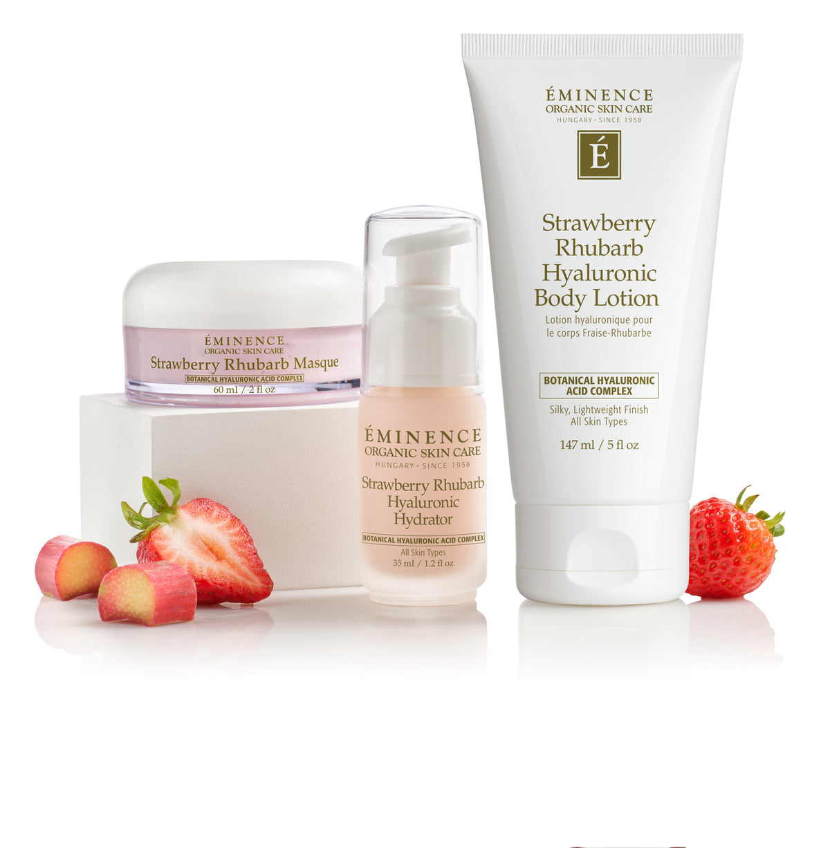 Eminence Organic Strawberry Rhubarb Hyaluronic Collection with fruit on white back ground