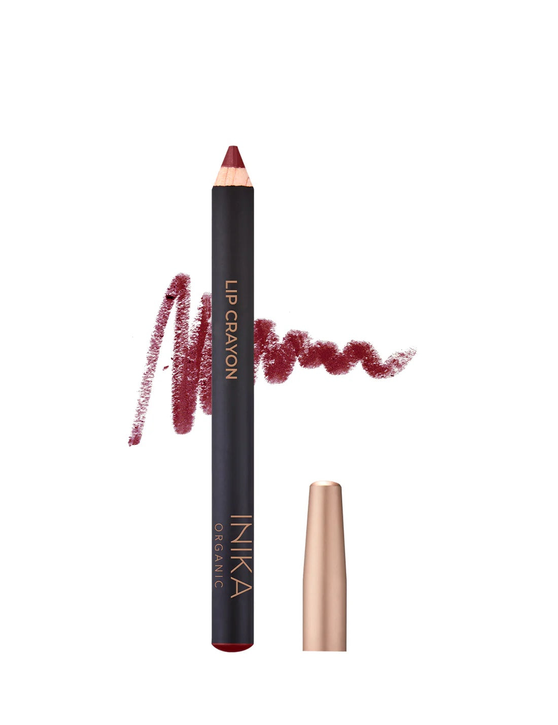Inika lip crayon with a wavy line of colour on a white background