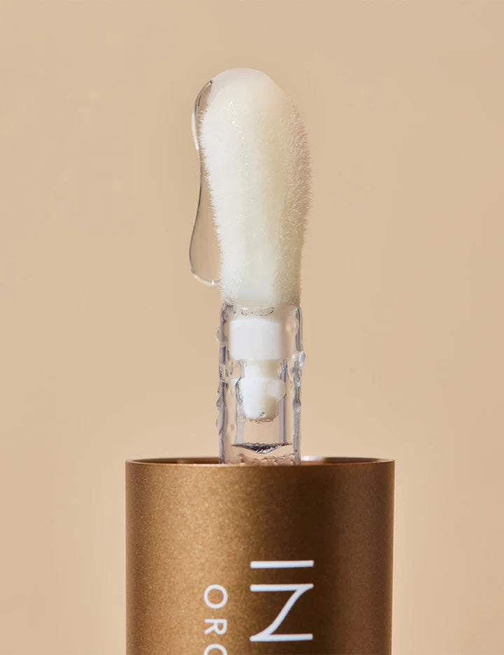Cosmetic applicator with foam on a beige background