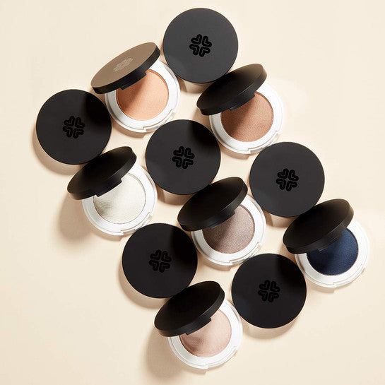 Lily Lolo Pressed Eye Shadow collection - full range of colours of this pressed eye shadow - some open, some closed.