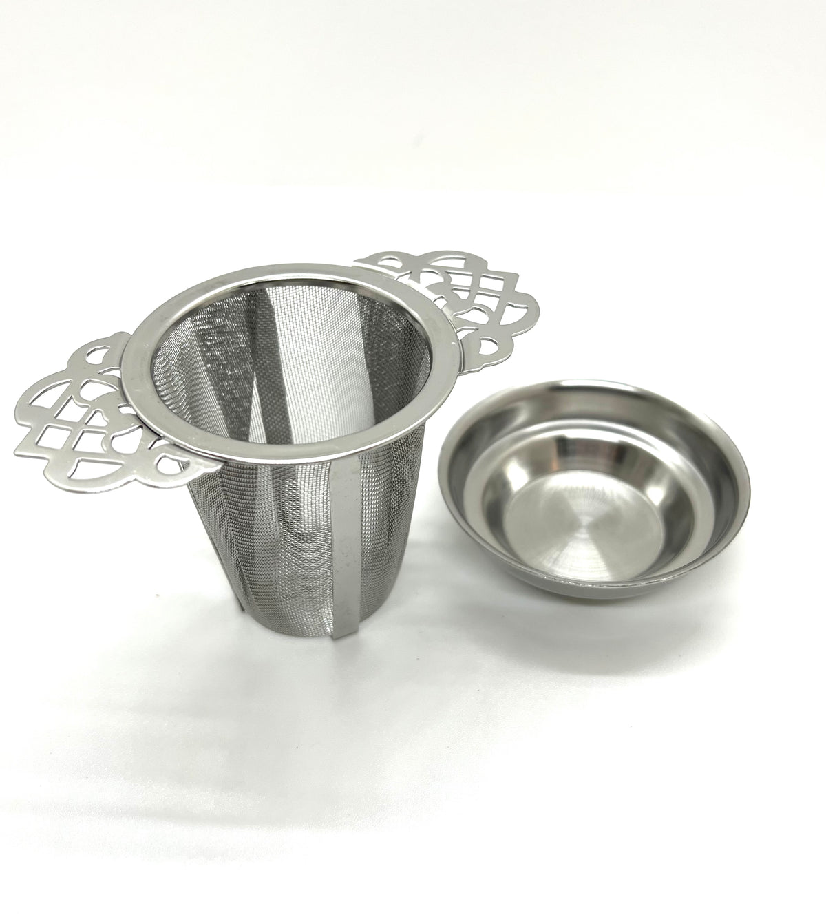 Stainless steel cup mug tea infuser with drip tray on white background