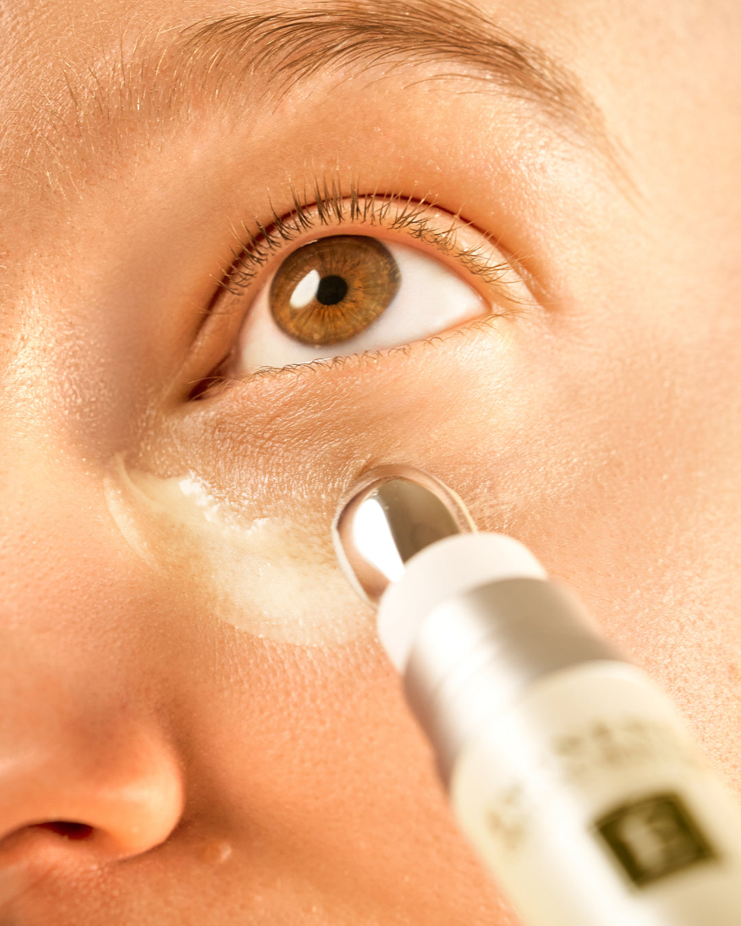 Éminence Organic Vitamin-C-eye_cream_in_use on model