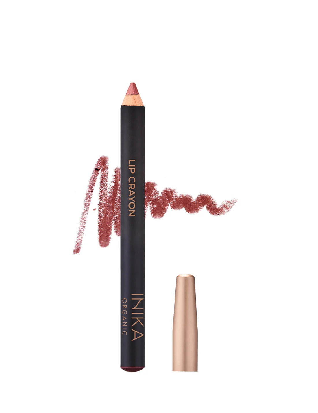 Inika lip crayon with a wavy line of colour on a white background