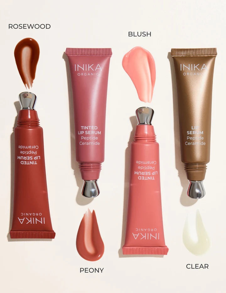 INIKA lip serum products with color swatches labeled Rosewood, Blush, Peony, and Clear on a light background.